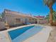 Inviting swimming pool in a sunny backyard oasis at 8474 Orange Cliff Ct, Las Vegas, NV 89123