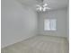 Spacious bedroom with ceiling fan and neutral carpeting at 8805 Jeffreys St # 1019, Las Vegas, NV 89123