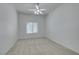 Bright bedroom with ceiling fan and neutral carpeting at 8805 Jeffreys St # 1019, Las Vegas, NV 89123