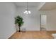 Bright dining area with tile floors and a chandelier at 8805 Jeffreys St # 1019, Las Vegas, NV 89123