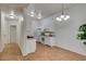 Kitchen boasts white cabinets and granite countertops at 8805 Jeffreys St # 1019, Las Vegas, NV 89123