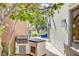 Outdoor kitchen with built-in grill and ample counter space at 8941 Diamond Falls Dr, Las Vegas, NV 89117