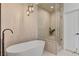 Relaxing bathroom with a soaking tub and a separate shower at 8941 Diamond Falls Dr, Las Vegas, NV 89117