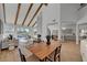 Light-filled dining room adjacent to the living room and kitchen at 8941 Diamond Falls Dr, Las Vegas, NV 89117