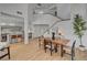 Light-filled dining area features a wood table and modern chairs at 8941 Diamond Falls Dr, Las Vegas, NV 89117