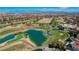 Aerial view of golf course, clubhouse, and community at 8941 Diamond Falls Dr, Las Vegas, NV 89117