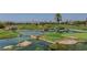 Golf course with water features and landscaping at 8941 Diamond Falls Dr, Las Vegas, NV 89117