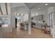 Modern kitchen with gray cabinets, marble countertops, and wood flooring at 8941 Diamond Falls Dr, Las Vegas, NV 89117