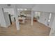 Modern kitchen with light gray cabinets and an island at 8941 Diamond Falls Dr, Las Vegas, NV 89117