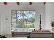 Kitchen with a pool view, gray cabinets, and modern fixtures at 8941 Diamond Falls Dr, Las Vegas, NV 89117