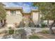 Inviting exterior with well-maintained landscaping and convenient stair access to upper-level units at 904 Domnus Ln # 201, Las Vegas, NV 89144