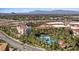 Luxury resort with multiple buildings, pools, and lush landscaping at 9201 Las Manaitas Ave # 302, Las Vegas, NV 89144