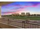 Balcony view overlooking the golf course at sunset at 9201 Las Manaitas Ave # 302, Las Vegas, NV 89144