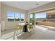 Bright dining area with stunning golf course views at 9201 Las Manaitas Ave # 302, Las Vegas, NV 89144