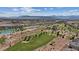 Expansive golf course with scenic desert landscape and lake at 9201 Las Manaitas Ave # 302, Las Vegas, NV 89144