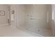 Large walk-in shower with tiled walls at 9201 Las Manaitas Ave # 302, Las Vegas, NV 89144