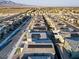 Aerial perspective of a residential neighborhood with solar panels on homes at 9281 Albus Hills Ave, Las Vegas, NV 89143