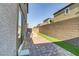 Relaxing backyard patio with seating area and artificial turf at 9281 Albus Hills Ave, Las Vegas, NV 89143