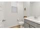 Clean bathroom with gray vanity, white countertop, and updated fixtures at 9281 Albus Hills Ave, Las Vegas, NV 89143