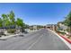 Landscaped entrance to a residential community at 9281 Albus Hills Ave, Las Vegas, NV 89143