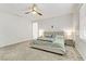 Bright and airy main bedroom with a large bed and plenty of space at 9281 Albus Hills Ave, Las Vegas, NV 89143