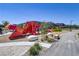 Community playground featuring a dinosaur-themed play structure at 9281 Albus Hills Ave, Las Vegas, NV 89143