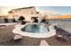 Relaxing backyard oasis with a sparkling pool and waterfall feature at 9290 Cool Creek Ave, Las Vegas, NV 89147