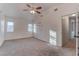 Bright bedroom featuring a ceiling fan and ample space at 9290 Cool Creek Ave, Las Vegas, NV 89147