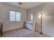 Bedroom with dresser, floor lamp, and closet at 9290 Cool Creek Ave, Las Vegas, NV 89147