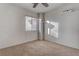 Sunny bedroom with a window and ceiling fan at 9290 Cool Creek Ave, Las Vegas, NV 89147