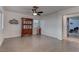 Bright and airy common area with a wooden display cabinet at 9290 Cool Creek Ave, Las Vegas, NV 89147