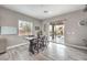 Bright dining area with sliding glass doors leading to the backyard at 9705 Yellow Shadow Ave, Las Vegas, NV 89149