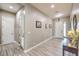 Bright and spacious entryway with wood-look tile flooring at 9705 Yellow Shadow Ave, Las Vegas, NV 89149