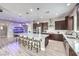 Modern kitchen with a large island and ample cabinet space at 9705 Yellow Shadow Ave, Las Vegas, NV 89149