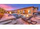 Resort-style pool with fire pit and patio furniture at 9705 Yellow Shadow Ave, Las Vegas, NV 89149