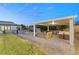 Outdoor kitchen and patio with seating and fire pit at 1121 Du Fort Hills Ct, Henderson, NV 89002