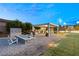 Relaxing patio area with fire pit and outdoor seating at 1121 Du Fort Hills Ct, Henderson, NV 89002