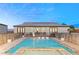 Inviting rectangular pool with built-in spa and fountains at 1121 Du Fort Hills Ct, Henderson, NV 89002