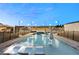 Stunning pool with lounge chairs and patio umbrella at 1121 Du Fort Hills Ct, Henderson, NV 89002