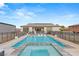 Inviting rectangular pool with spa and safety fence at 1121 Du Fort Hills Ct, Henderson, NV 89002