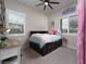 Bedroom with black platform bed, desk and window seating area at 11885 Grassy Plain Ave, Las Vegas, NV 89138