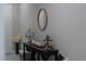 Modern console table with mirror in entryway at 11885 Grassy Plain Ave, Las Vegas, NV 89138