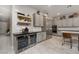 Modern kitchen with beverage fridge and gray cabinetry at 11885 Grassy Plain Ave, Las Vegas, NV 89138