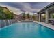 Stunning pool and spa with water feature and mountain views at 11885 Grassy Plain Ave, Las Vegas, NV 89138