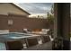 Backyard with pool, spa, fire pit and patio furniture at 11885 Grassy Plain Ave, Las Vegas, NV 89138