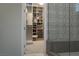 Bright walk-in closet with built-in shelving and shoe storage at 11885 Grassy Plain Ave, Las Vegas, NV 89138