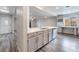 Open concept kitchen featuring white cabinets, modern appliances, and great lighting at 1309 Jimmy Ave, Las Vegas, NV 89106