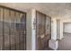 Building entry with security gate and numbered doors at 1405 Vegas Valley Dr # 392, Las Vegas, NV 89169