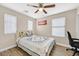 Charming bedroom with wood floors and a ceiling fan at 1903 Sundown Canyon Dr, Henderson, NV 89014