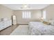 Spacious Primary bedroom with wood floors and a large window at 1903 Sundown Canyon Dr, Henderson, NV 89014